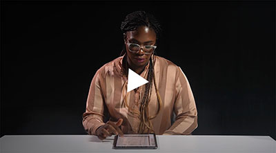 Still image of a videotaped reading by Kadiatou Tubman
